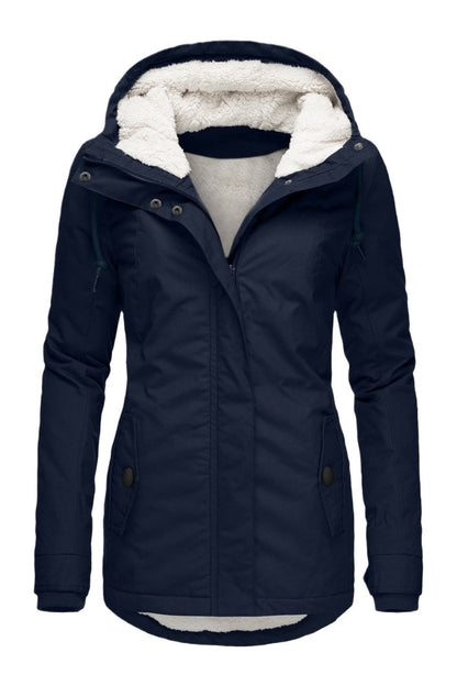 Getailleerde damesparka met teddyvoering en capuchon - marineblauw