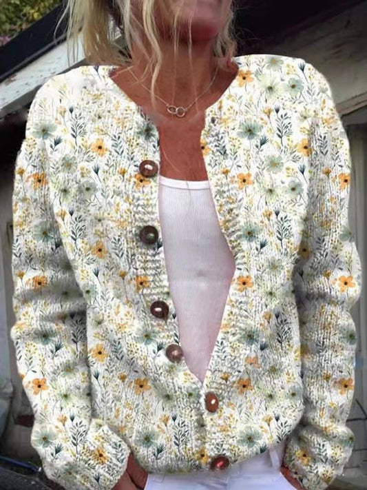 Gebreid damesvest met print, ronde hals en bruine knopen - crème met gele bloemen