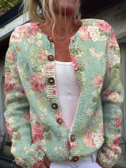 Gebreid damesvest met print, ronde hals en bruine knopen - mintgroen met rozen