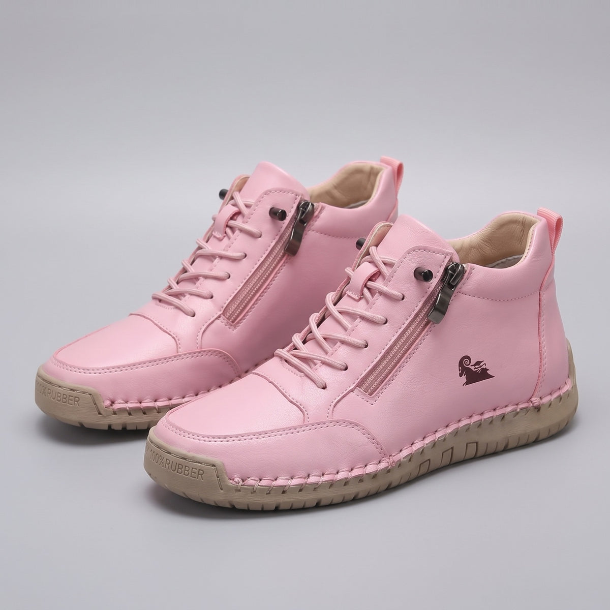 Enkelhoge damessneakers met zijrits, veters en antislip zool - roze