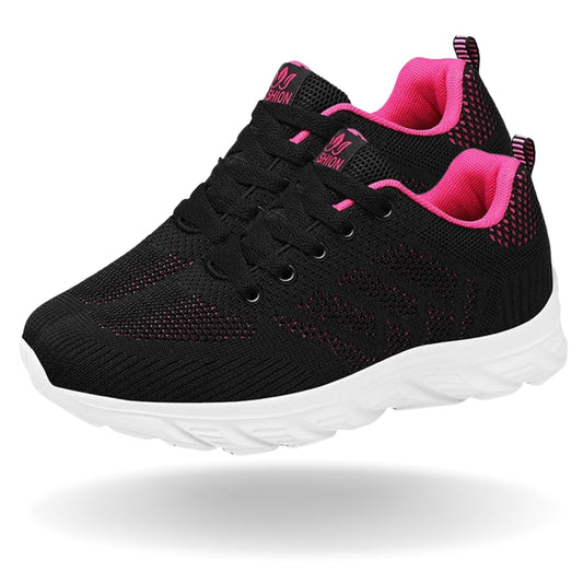 Ergonomische damessneakers met gebreid bovenwerk en dikke witte zool