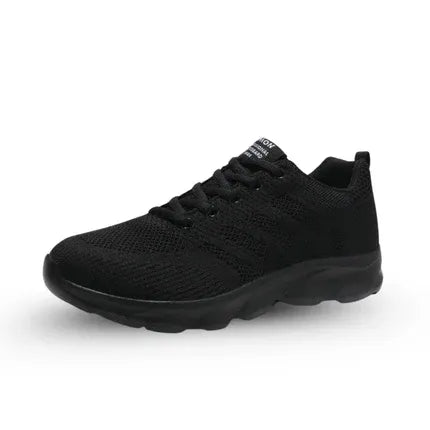 Ergonomische damessneakers met gebreid bovenwerk en dikke witte zool