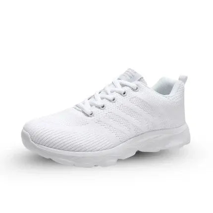 Ergonomische damessneakers met gebreid bovenwerk en dikke witte zool