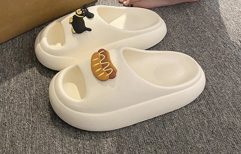EVA slippers met gesloten neus, dikke zool en speelse opzetjes op de wreef - beeld 3