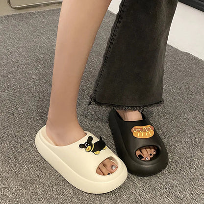 EVA slippers met gesloten neus, dikke zool en speelse opzetjes op de wreef - beeld 5