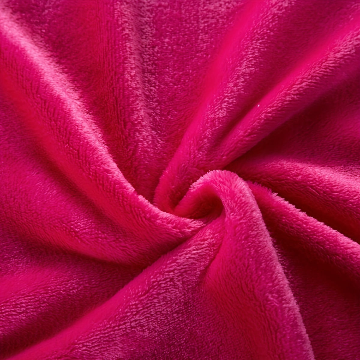 Effen fleece deken van flanel over een bed - beeld 2