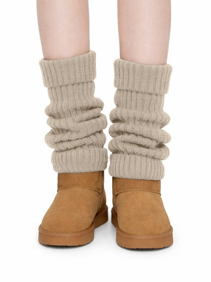 Gebreide beenwarmers voor dames in grove rib met omslagboord - beige