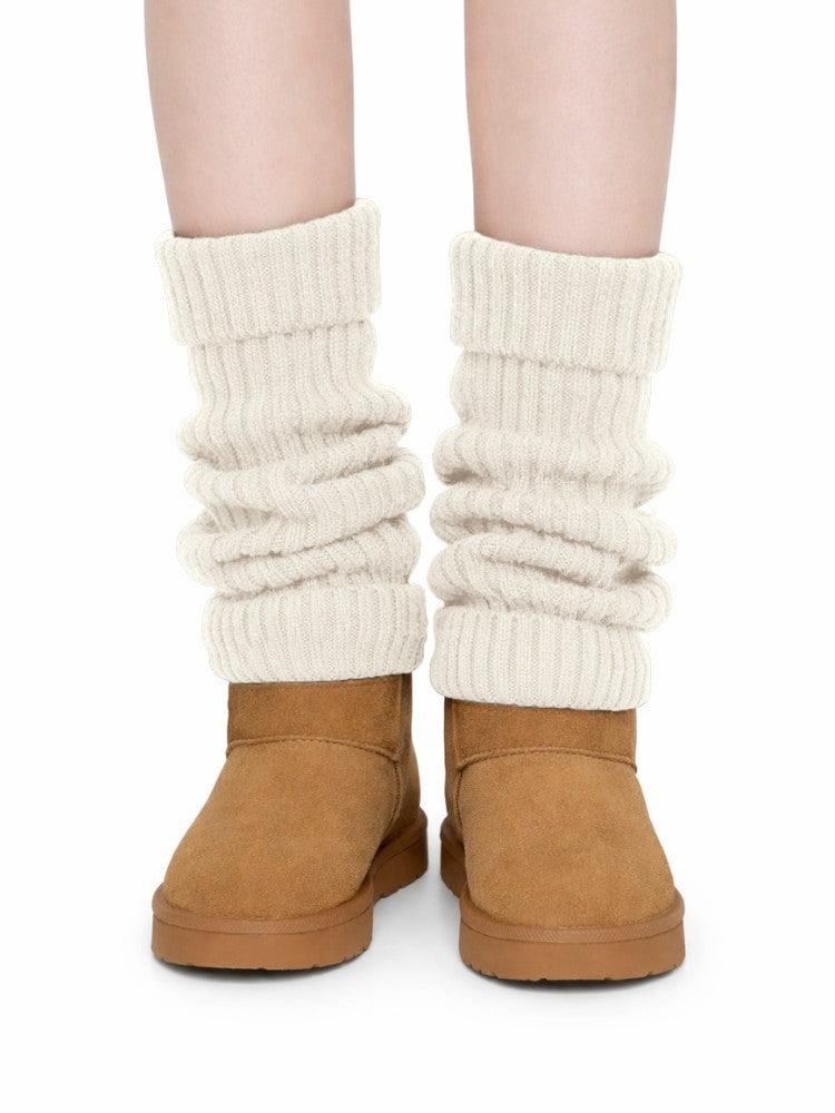 Gebreide beenwarmers voor dames in grove rib met omslagboord - crème