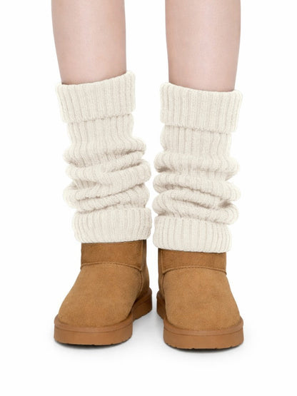 Gebreide beenwarmers voor dames in grove rib met omslagboord - crème