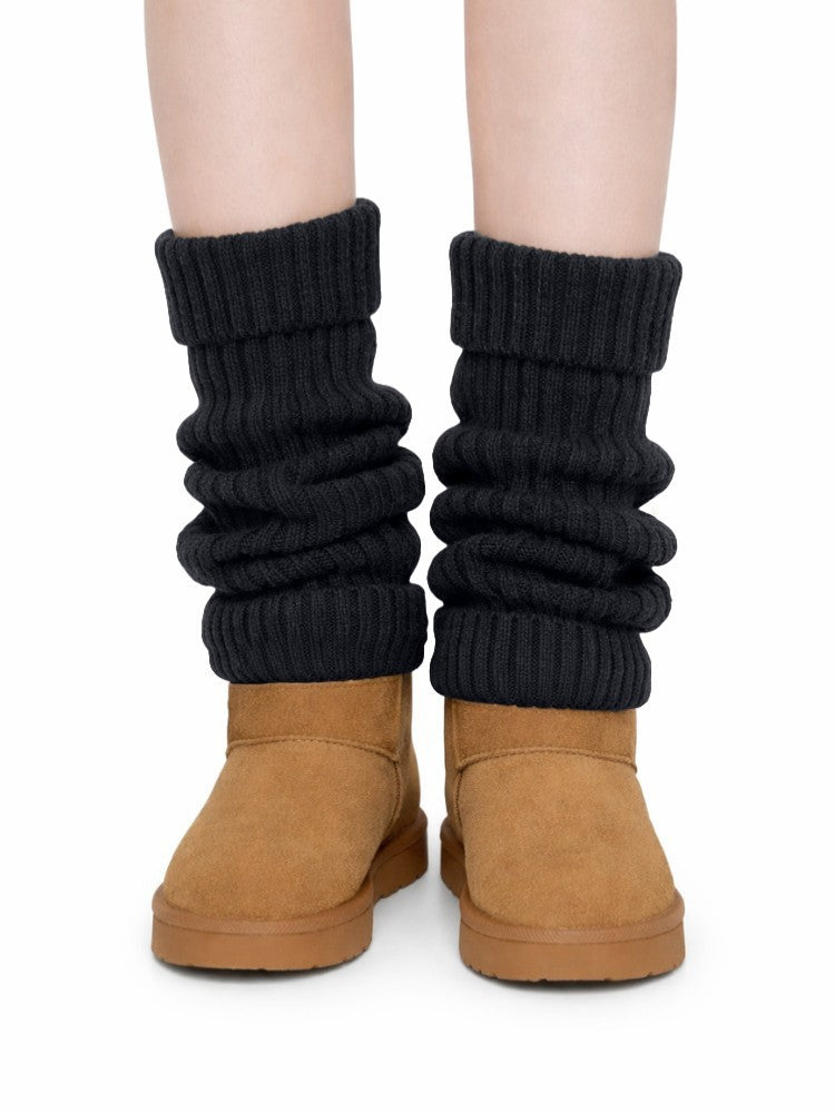 Gebreide beenwarmers voor dames in grove rib met omslagboord - zwart