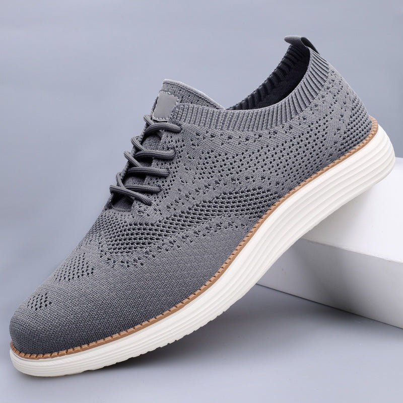 Gebreide herensneakers in brogue-stijl met vleugelneus en witte sneakerzool - grijs