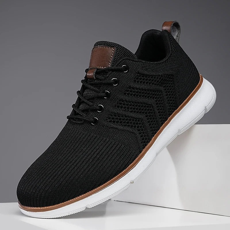 Gebreide herensneakers met open chevronmotief, lichte zool en tabje in leerlook - zwart met wit