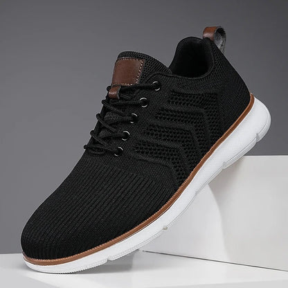 Gebreide herensneakers met open chevronmotief, lichte zool en tabje in leerlook - zwart met wit
