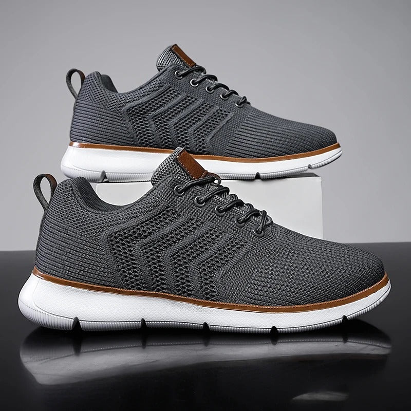 Gebreide herensneakers met open chevronmotief, lichte zool en tabje in leerlook - donkergrijs