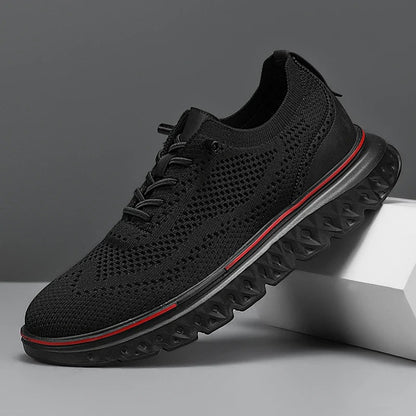 Gebreide herensneakers van mesh met hielstuk in leerlook, rode bies langs de zool en elastische veters - zwart