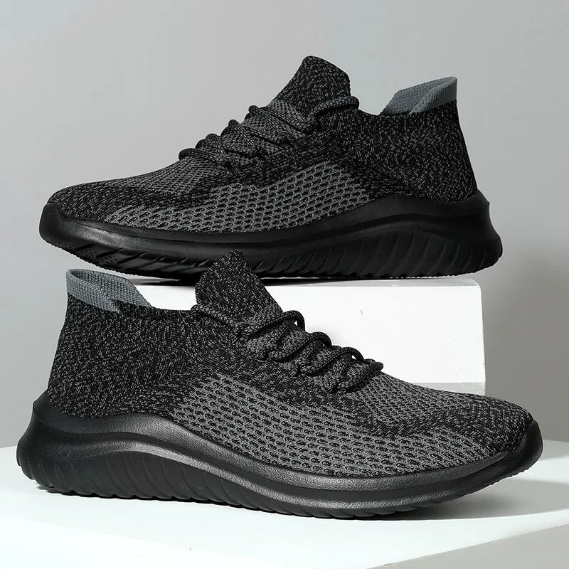 Gebreide herensneakers met sokmodel, veters en lichte dempende zool - antraciet