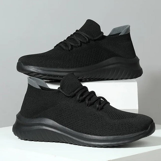 Gebreide herensneakers met sokmodel, veters en lichte dempende zool - zwart