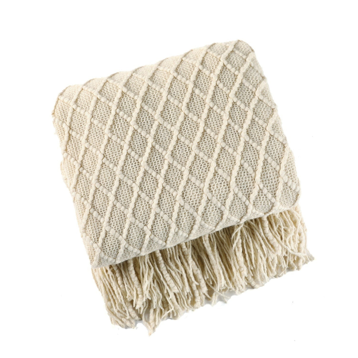 Gebreide plaid met Scandinavisch patroon en franjes over een stoel - ecru