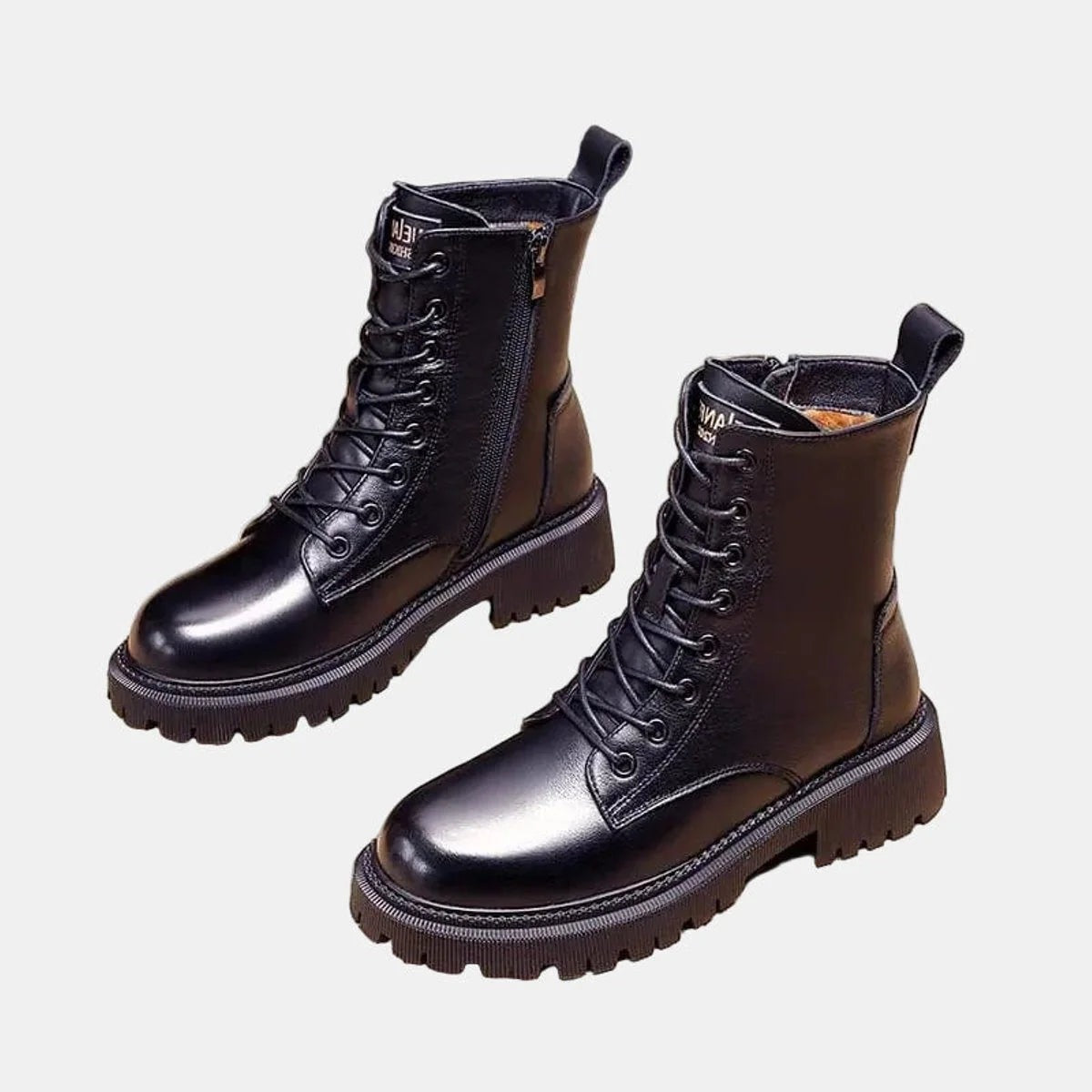 Gevoerde combat boots voor dames met veters, zijrits en profielzool