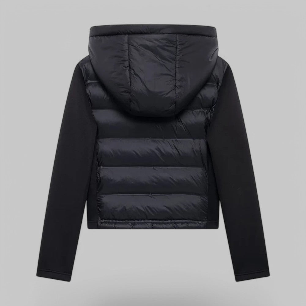 Kort gewatteerd damesjack met capuchon en mouwen van tricot