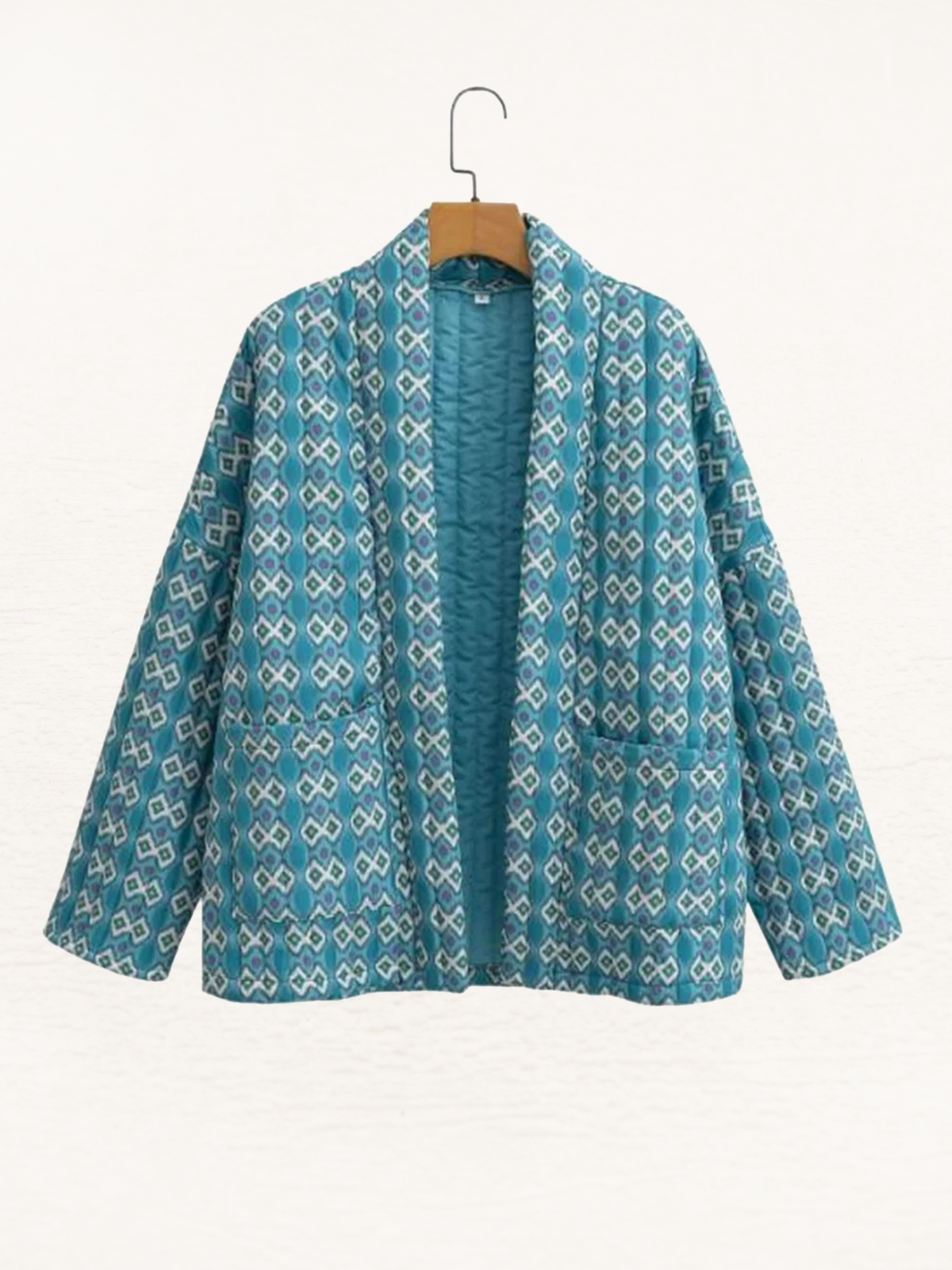Gewatteerd damesjack in kimonostijl met geometrische print en open voorkant - turquoise