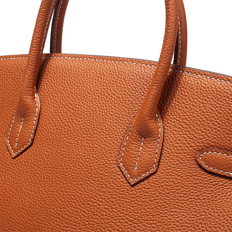 Handtas voor dames met twee ronde handgrepen, klep met draaisluiting en hangslotje