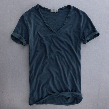 Slim fit heren T-shirt met diepe V-hals, rolrand en omgeslagen korte mouwen - petrolblauw