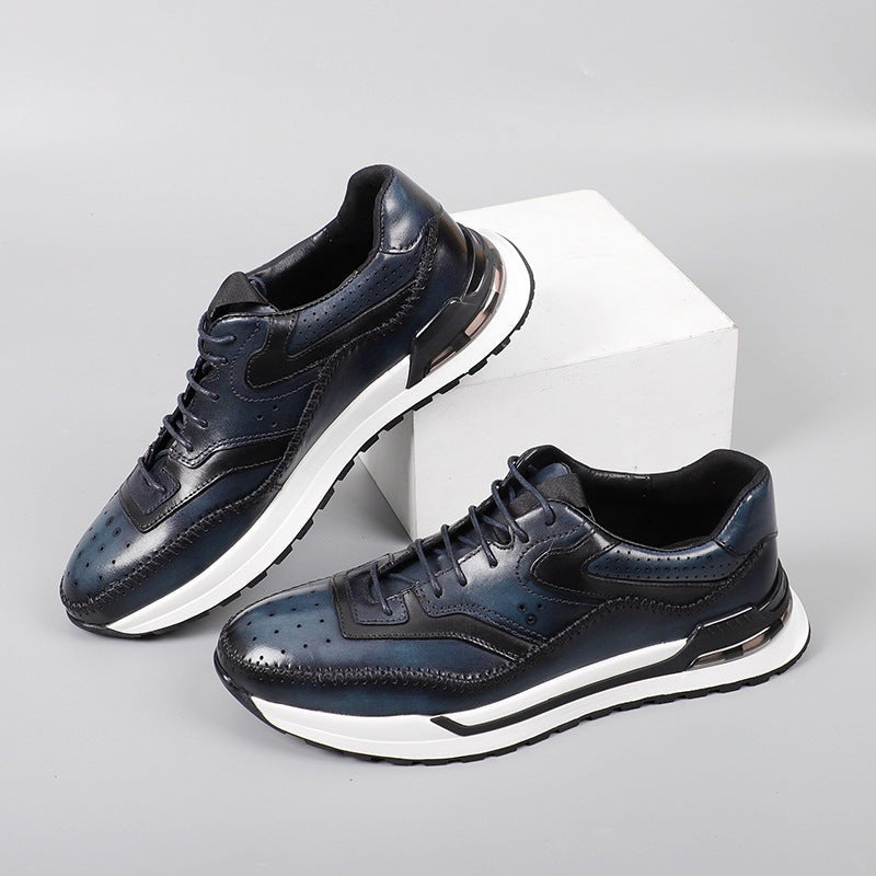 Herensneakers in leerlook met patina, brogue-perforatie en een zichtbaar luchtkussen in de hiel - marineblauw