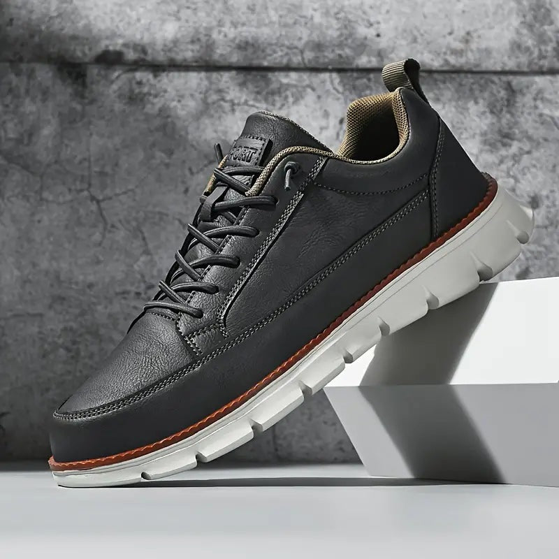 Herensneakers in gladde leerlook met flexibele zool met groeven en cognac rand - antraciet