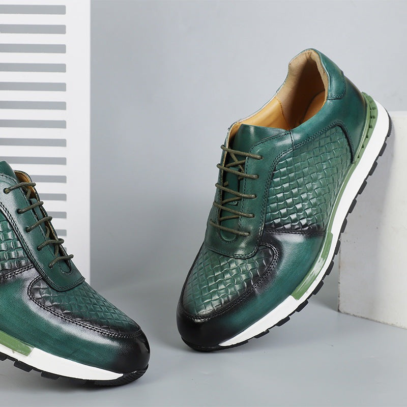 Herensneakers in leerlook met geperst vlechtmotief en witte profielzool - flessengroen