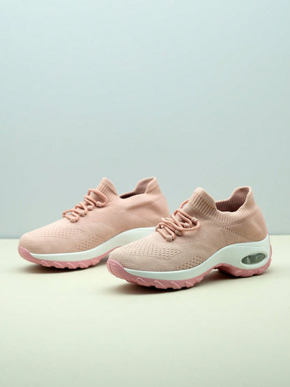 Instap sneakers voor dames met gebreide schacht, sierveters en dikke zool met zichtbare luchtkamer - roze