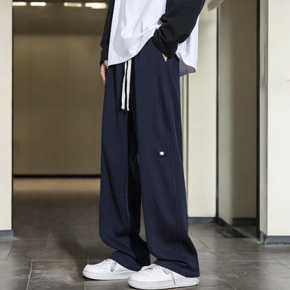 Joggingbroek voor heren met fleece binnenkant, rechte pijp en lipje met drukknoop op de dij - marineblauw