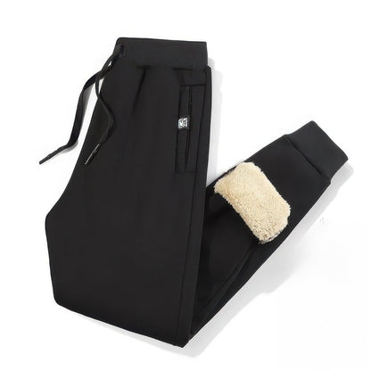 Joggingbroek voor heren met teddyvoering, elastische taille en trekkoord - zwart - met boord