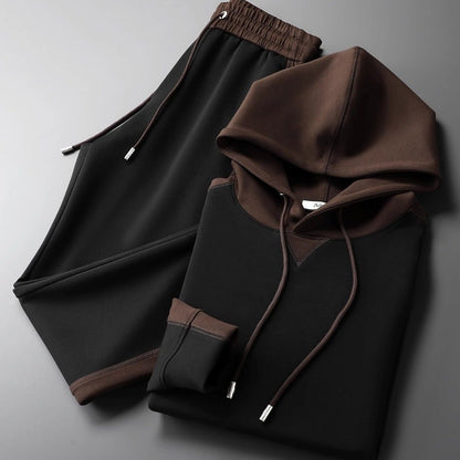 Tweedelig joggingpak voor heren met colour-block hoodie en joggingbroek met bies - zwart