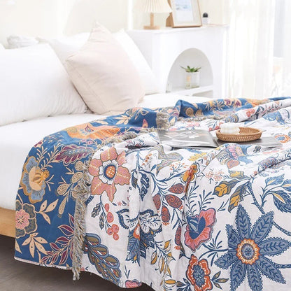 Katoenen jacquard plaid met bloemenmotief en franjes over de bank