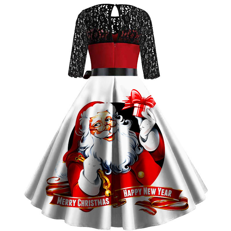 Kerstjurk met zwarte kanten mouwen, rood lijfje en wijde rok met kerstmanprint