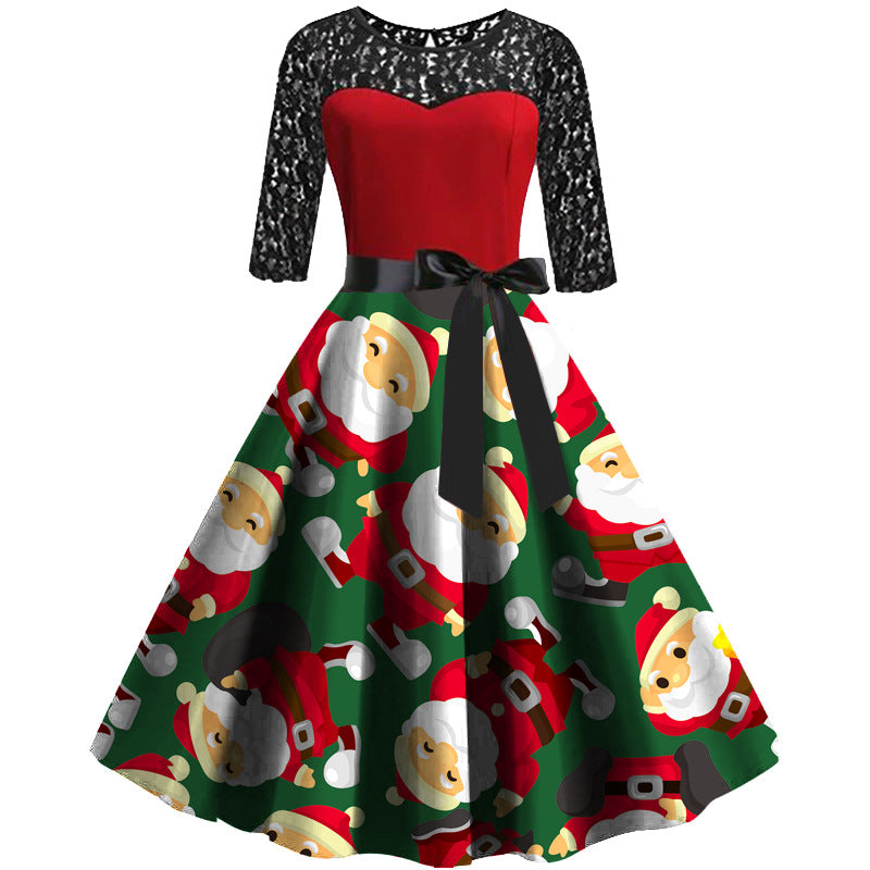 Kerstjurk met zwarte kanten mouwen, rood lijfje en wijde rok met kerstmanprint - groen met kerstmannetjes