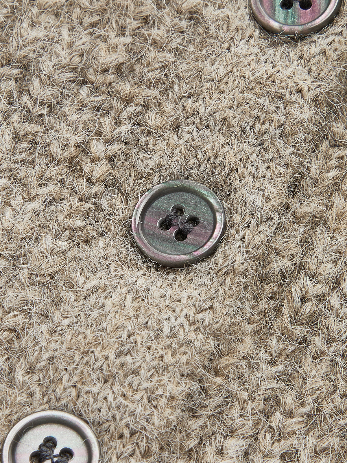 Lang damesvest met V-hals, kleine knopen en uitlopende mouwen