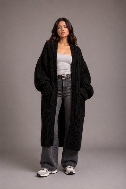 Lang oversized damesvest in grof breisel met open voorkant en zakken - zwart