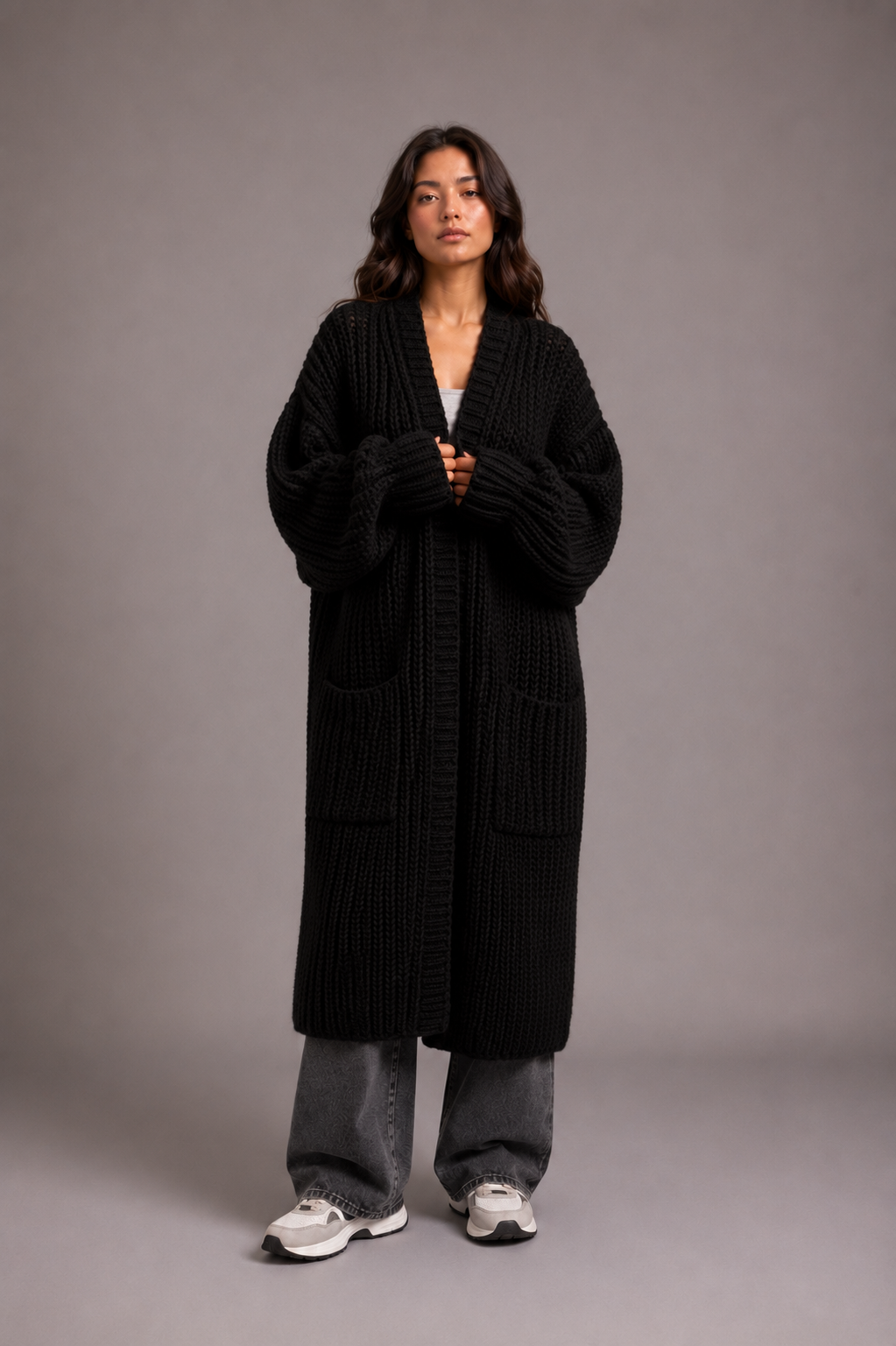 Lang oversized damesvest in grof breisel met open voorkant en zakken