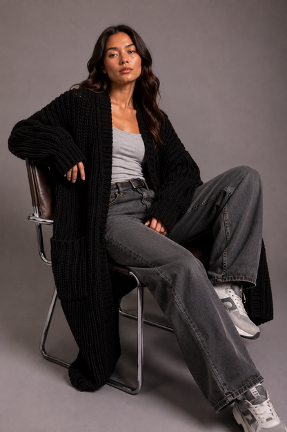 Lang oversized damesvest in grof breisel met open voorkant en zakken