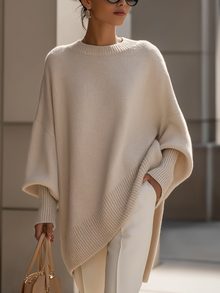 Lange oversized damestrui met brede mouwen en ribgebreide hals, manchetten en zoom - beige