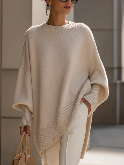 Lange oversized damestrui met brede mouwen en ribgebreide hals, manchetten en zoom - beige