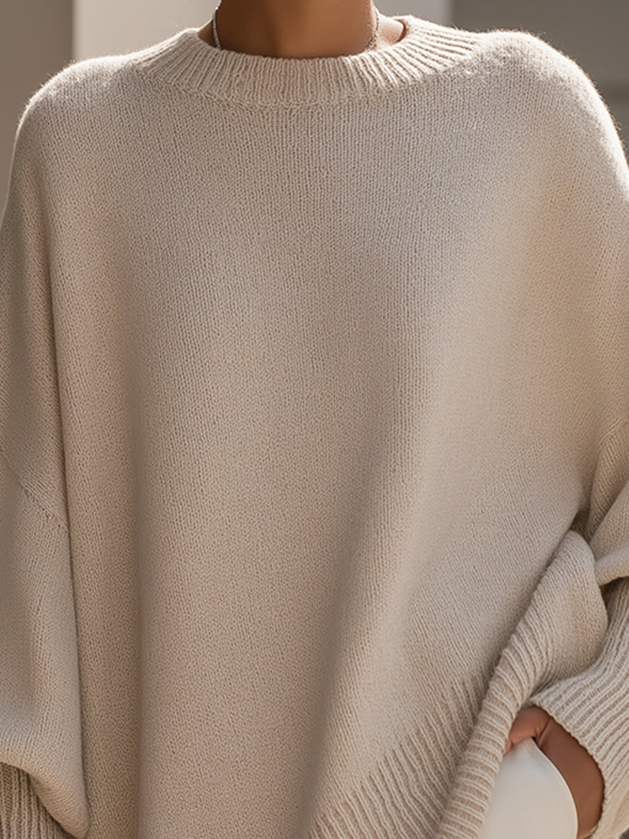Lange oversized damestrui met brede mouwen en ribgebreide hals, manchetten en zoom - beige