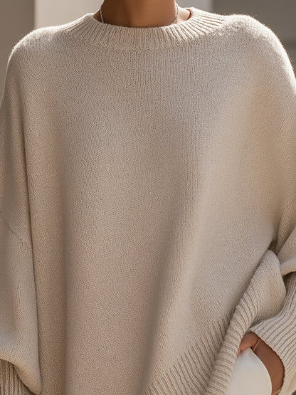 Lange oversized damestrui met brede mouwen en ribgebreide hals, manchetten en zoom - beige