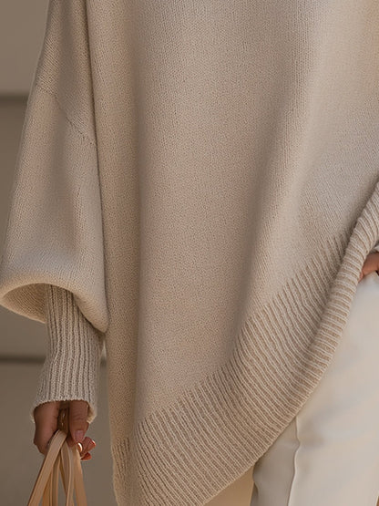 Lange oversized damestrui met brede mouwen en ribgebreide hals, manchetten en zoom - beige