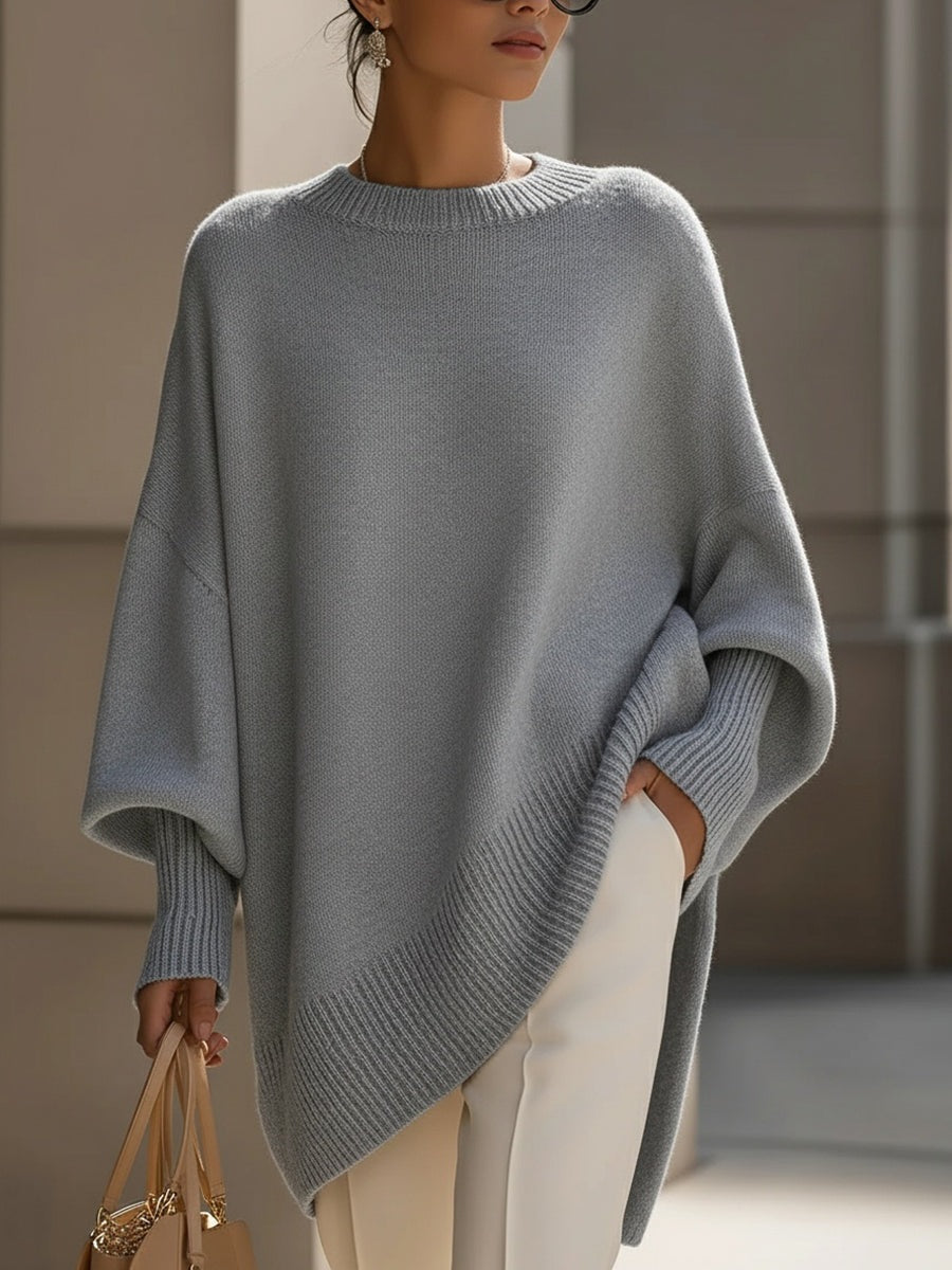 Lange oversized damestrui met brede mouwen en ribgebreide hals, manchetten en zoom - grijs