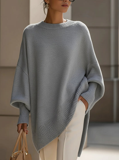 Lange oversized damestrui met brede mouwen en ribgebreide hals, manchetten en zoom - grijs