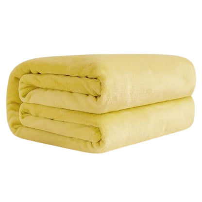 Lichte fleece deken van 150 x 200 cm, opgevouwen - lichtgeel