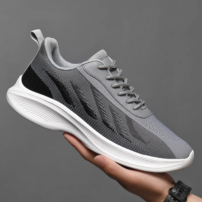 Lichte herensneakers van mesh met chevronmotief in kleurverloop en gebogen witte zool - grijs